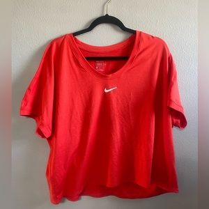 Red Nike shortsleeved shirt